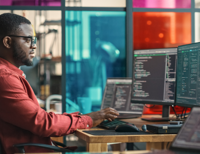 man looking at a computer