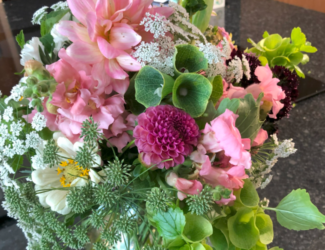 Pink flower arrangement made at the Black Fox Flower Class