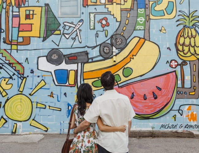 couple looking at mural 