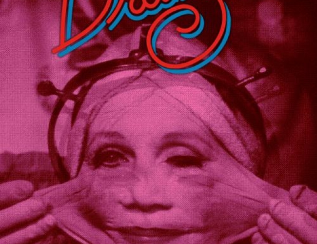 A photo of a woman in pink and red tones, with her cheeks and skin being pulled to the side. One eye is open and the other is closed. She is wearing some kind of device with screws holding it in place on her head. Text says: "sci-fi sunday: Brazil. The broadway theatre, sunday december 22nd, 2024, 4pm and all ages"