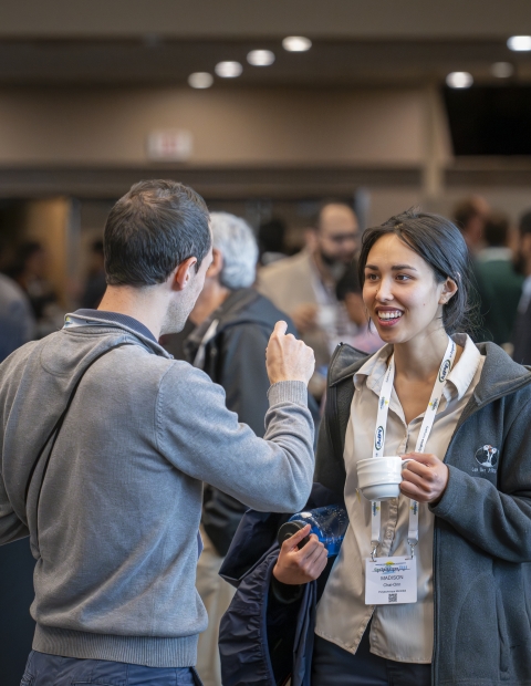 People having a conversation at a convention