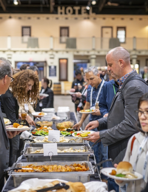 Crowd of individuals queuing for food