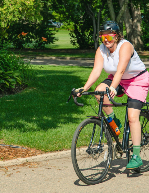 Person riding a bicycle on a trail in Saskatoon