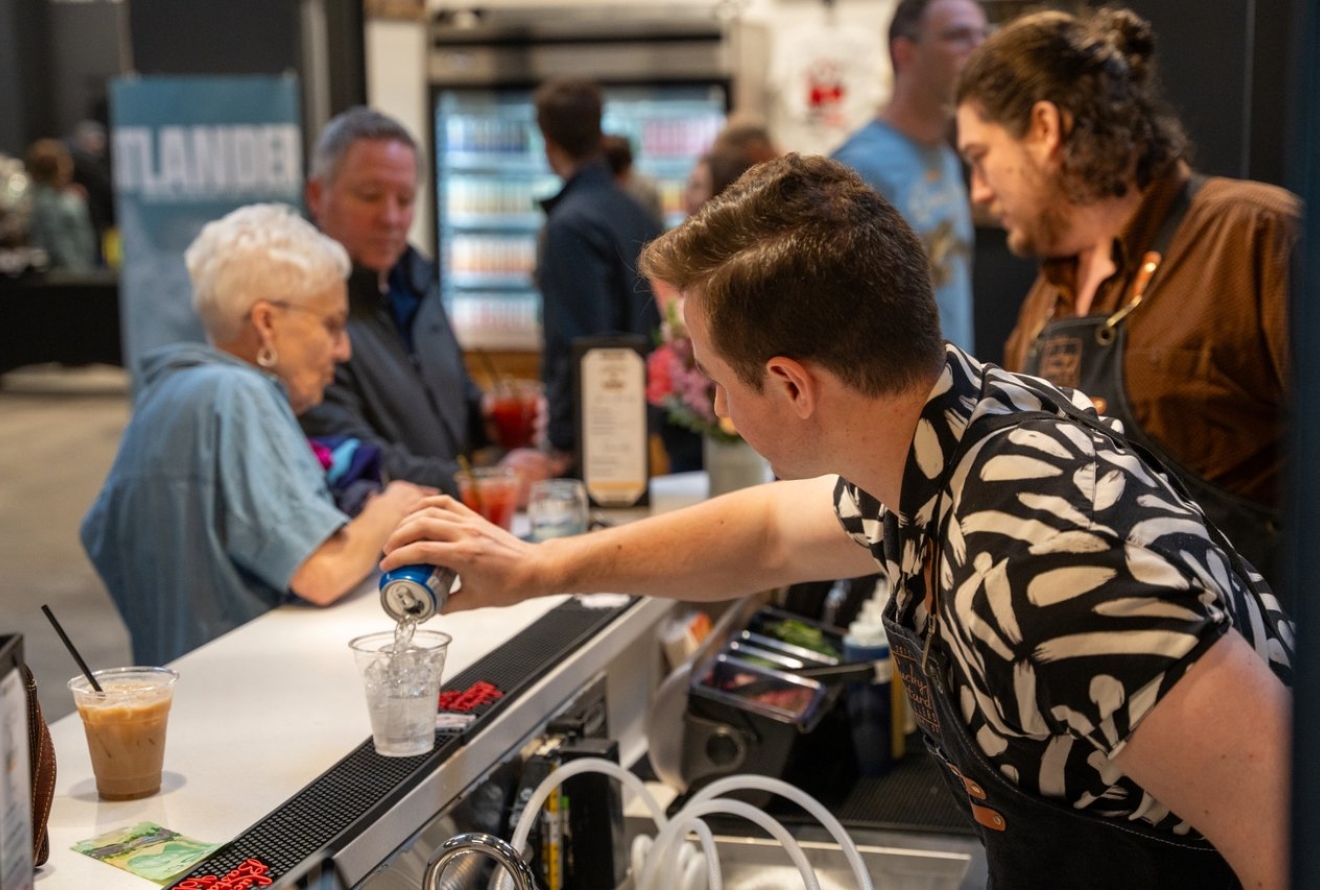 man pouring a drink 