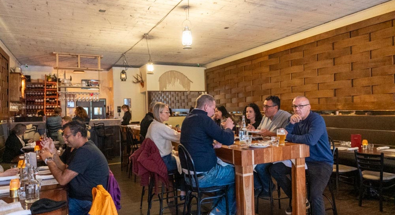 people enjoying food at Primal restaurant